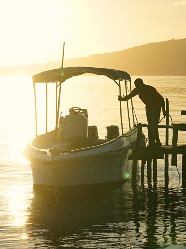 Sun setting on Barefoot speed boat
